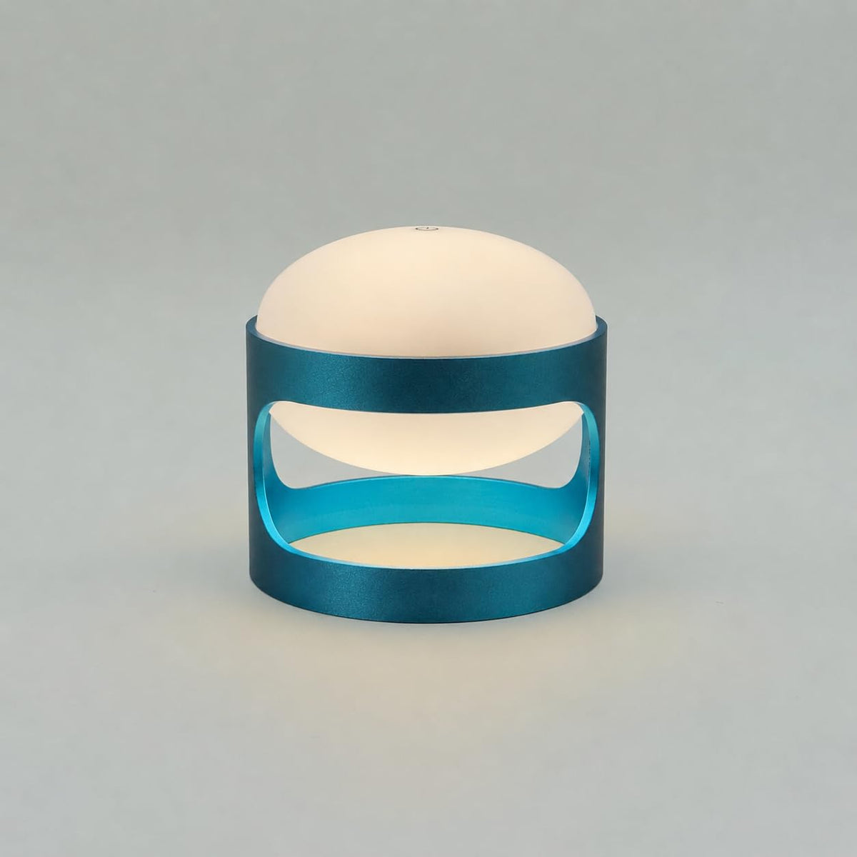Lotus Mini cordless lamp in Deep Teal Blue on a white background